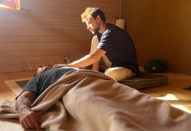 A person guiding a breathwork session 