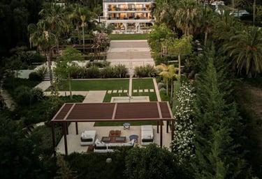 Villa Serenity aerial view with gardens and mountain backdrop