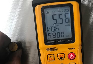 Ultrasonic thickness testing on ISO tank during inspection