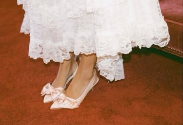 a woman in a white dress and shoes