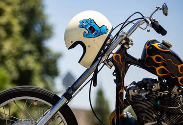 a motorcycle with a helmet on and a helmet on