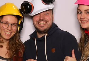 a man and woman in hard hats and hard hats