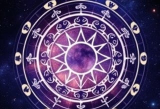 a zodiac sign with a star in the middle of it