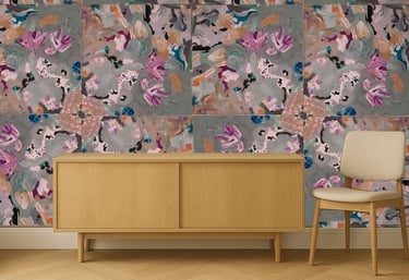 mid century modern furniture in front of vivacious wallpaper in grey and reddish hues.
