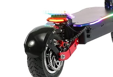 a scooter with a colorful colored lights on it