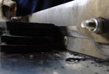 Rubber material cut and measured precisely for molding preparation