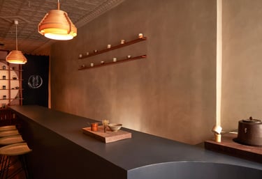 Sorate japan teahouse with warm lighting and a modern tea counter.