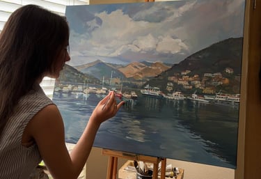 Angela Moiseieva at work on 'Whispers of Como' 24x30 inches Serene Harbor oil painting