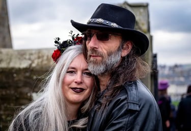 a man and woman in goth clothing at Whitby Goth weekend