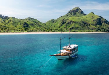 Boat anchored off the coast of Lombok, Indonesia, with turquoise waters and scenic island landscapes