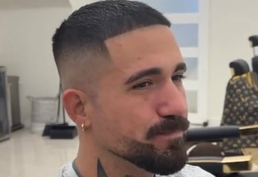 Precision zero fade and sharp beard lineup at Unlimited Barbershop in Etobicoke.