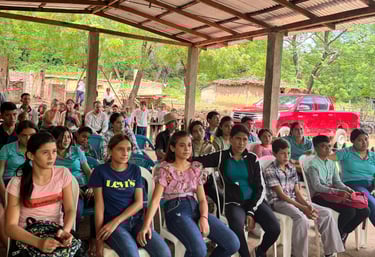 Students in Nicaragua sit together to hear testimonials.