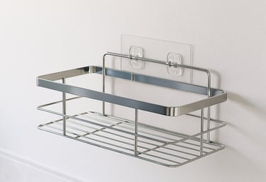 Proveedor chino de cestas adhesivas personalizadas para baño.