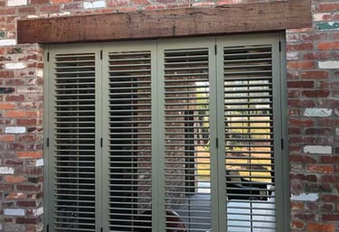 operable louver shutters with the louvers open to let light in