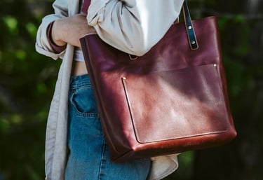 a woman in a white shirt and jeans jacket