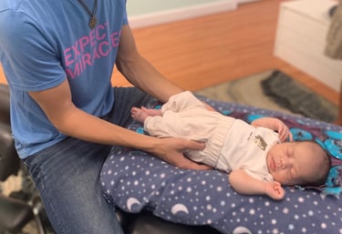 Safe, gentle chiropractic adjustment for newborns in Franklin, TN to ease colic, gas, and fussiness.