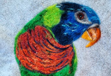 needle felted picture of a parrot