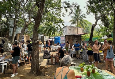 farmers market event with people standing and talking