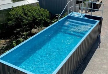 a container container pool with a ladder and a ladder
