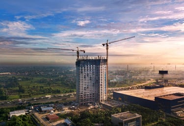 konstruksi apartement, jasa photography corporated.a crane is seen in this picture