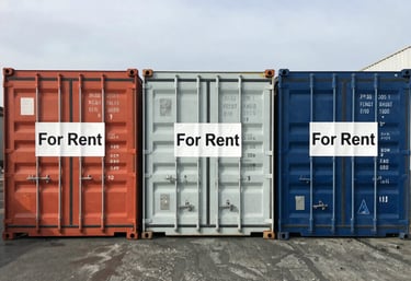 A sleek black and yellow delivery truck parked beside modern storage containers under a clear sky.