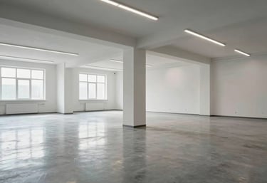 Interior view of a clean, post-construction commercial space in Central Europe, dust-free floors reflecting modern lighting, professional finish.