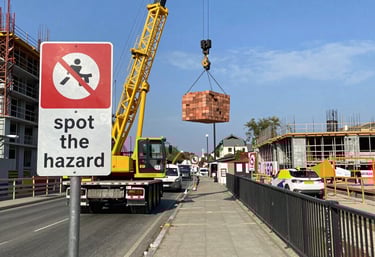 Group of trainees practicing fire drills outdoors with instructors.