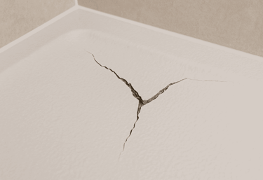 Cracked shower tray in an Auckland bathroom before professional repair by FixShowers