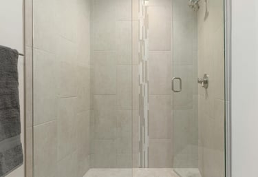 Modern frameless glass shower enclosure installed by FixShowers in an Auckland bathroom