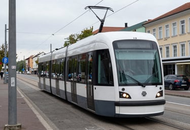 Electricians in safety gear performing grounding work on railway overhead lines near Stuttgart.