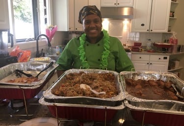 Chef T Proudly showing off her creation.
