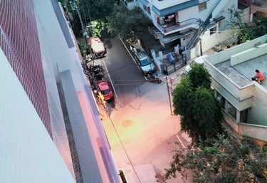 Close-up of a securely installed safety net covering a duct area in an industrial setting.