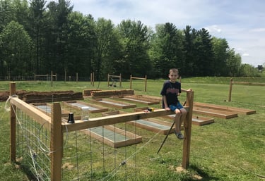 Building a fence and raised garden beds at our little Shire.
