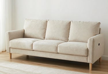 Before and after shot showing a sofa transformed from stained to spotless in a modern Geneva apartment.