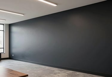 A clean and modern North American / Southern California office interior featuring perfectly painted dark charcoal accent walls.