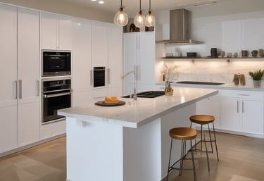 Modern white kitchen featuring a large marble island with wood bar stools and pendant lighting.