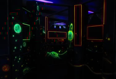 dark laser tag arena with glowing decorations