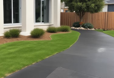 A team efficiently removing junk from a residential property driveway on a sunny day.