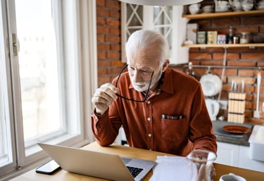 Retired Western professional reviewing retirement planning documents abroad