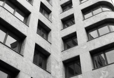 Photo of RS Buildcon team discussing blueprints on a construction site in Varanasi.