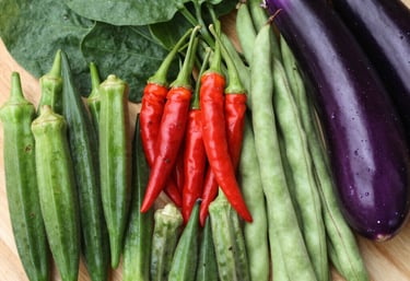 Colorful display of fresh vegetables and fruits at the supermarket.