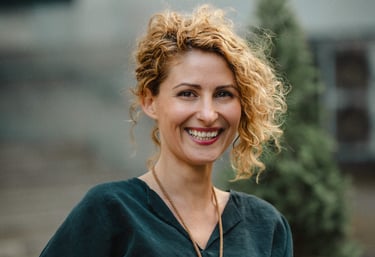 Valeria-Ivanova-PhD-smiling-holding-books