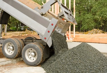 aggregate placement for commercial construction site support