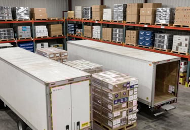 Workers from Canadian and Chinese backgrounds collaborating on a warehouse frame.