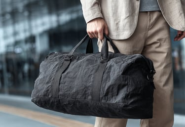 a mmen with a Lightweight duffle bag for promotional use