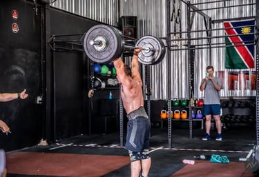 Professional athlete performing an Olympic lift
