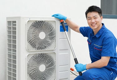 Technician carefully inspecting an air duct with a camera in a modern home.