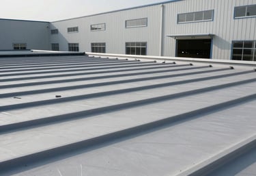 A finished commercial roofing project on a large warehouse facility, clean lines, industrial gray and white palette, professional architectural photography.