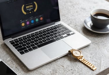 A high-end workspace featuring a laptop showing a secure interface, a gold-cased watch, and a cup of coffee on a light grey stone desk.
