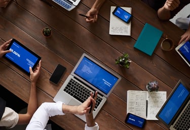 Business professionals reviewing HR policies and documentation